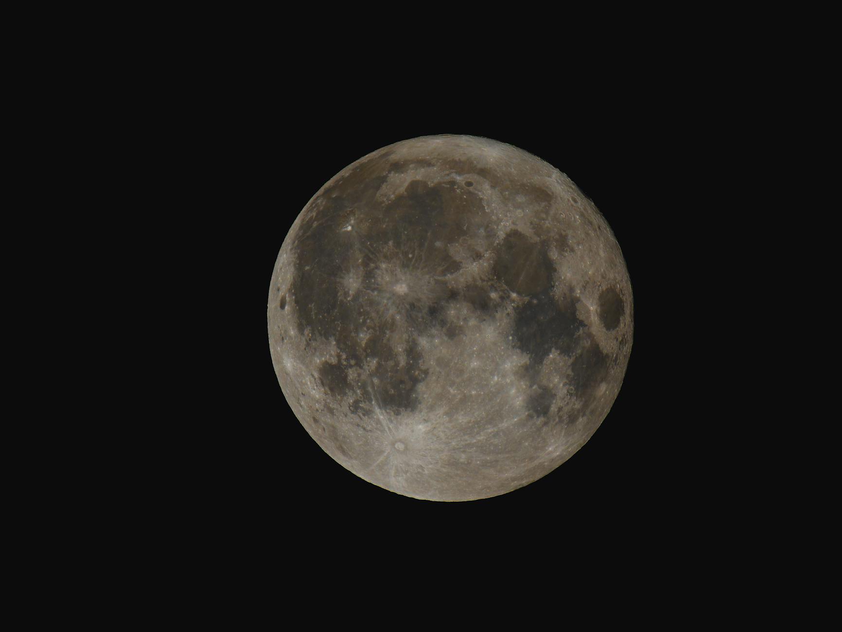 Stunning image of the full moon highlighted against a clear night sky.