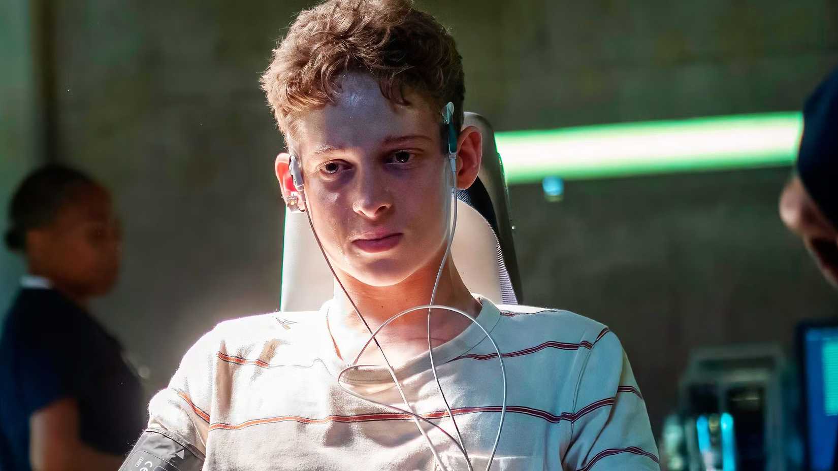 Joe Freeman as Luke Ellis being experimented on in The Institute