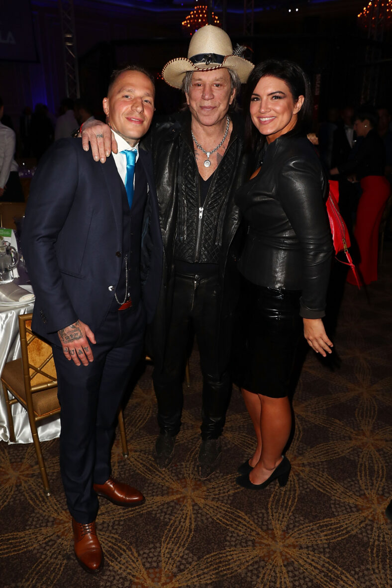 Kevin Ross, Mickey Rourke, and Gina Carano pose for photo together