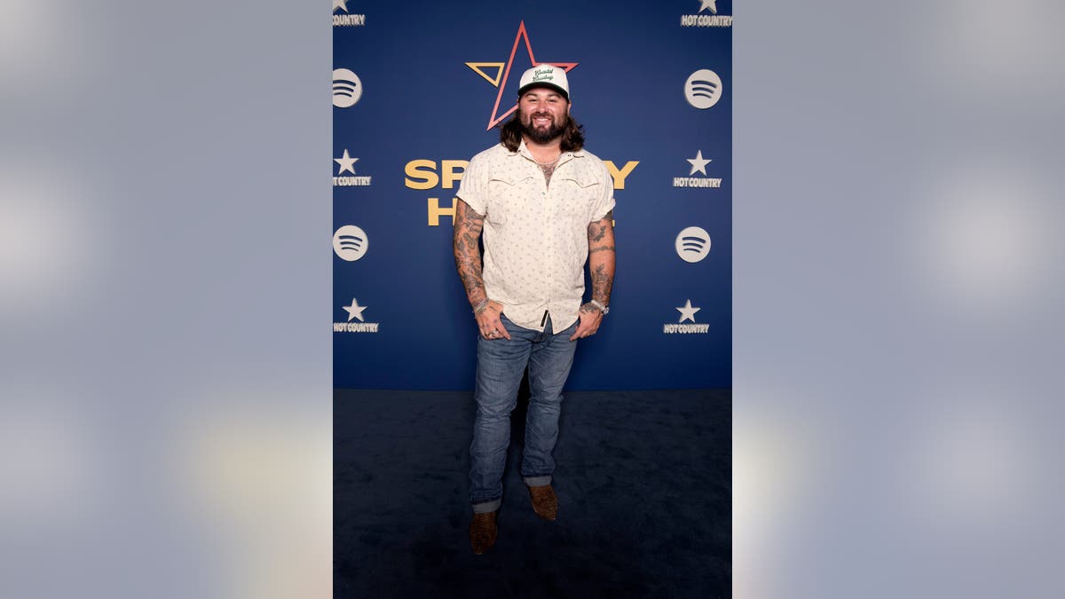 Koe Wetzel standing on stage at Spotify House during CMA Fest in Nashville