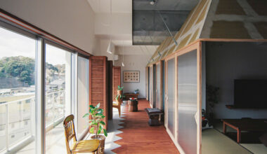 Kuma&Elsa arranges apartments around translucent "huts"