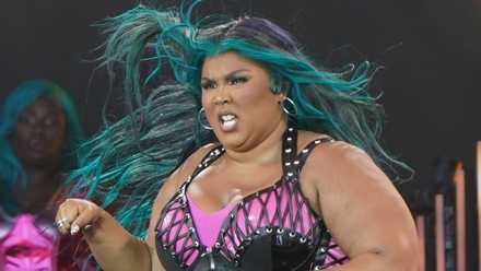 Lizzo performing on stage