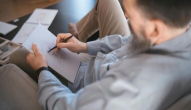 man sketching a drawing