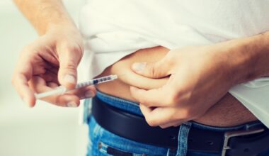 man with syringe making insulin injection 2026 03 25 10 50 16 utc