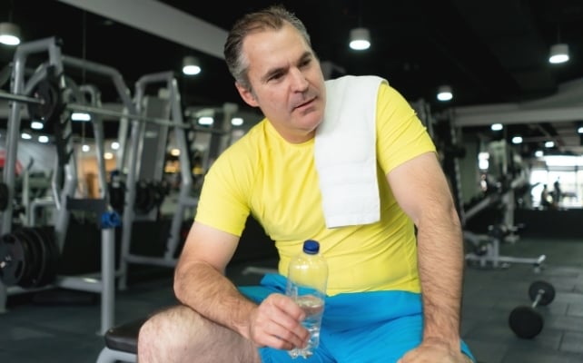 man resting after exercise