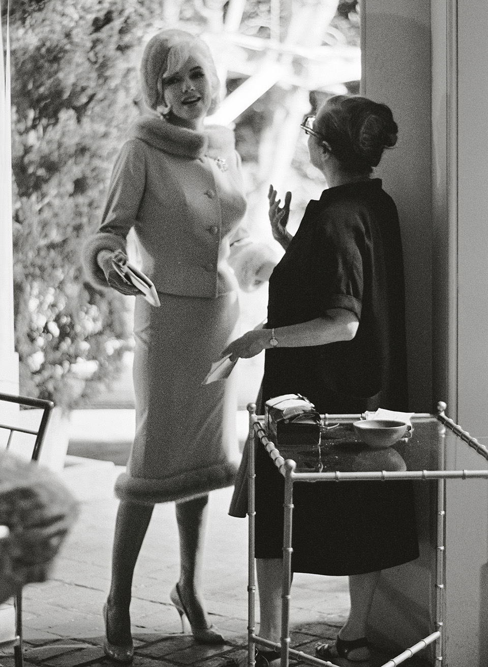 Monroe with acting coach and confidant Paula Strasberg, 1962.