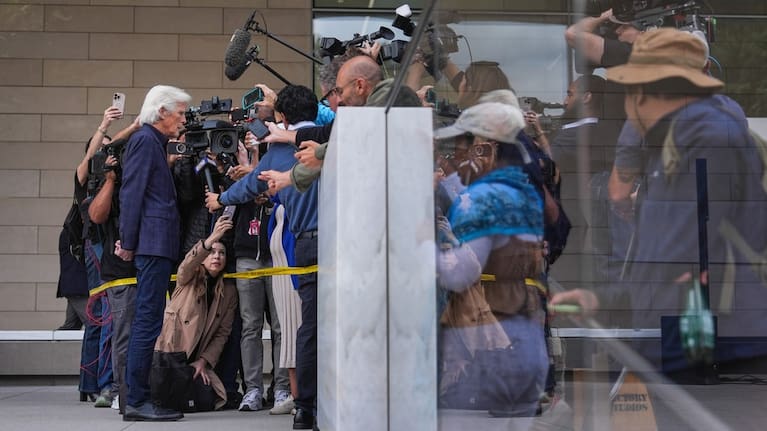 Matthew Perry's stepfather, Keith Morrison, left, talks to reporters after the sentencing of Kenneth Iwamasa in Los Angeles, Wednesday, May 27, 2026.