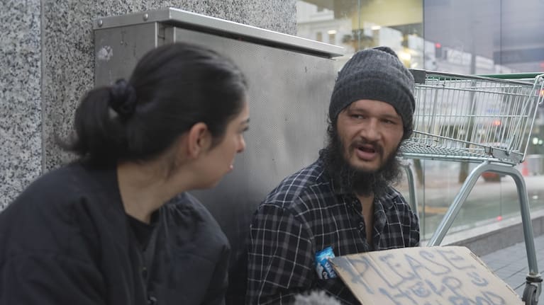 Mava Moayyed discusses the planned law with a man on Auckland's streets.