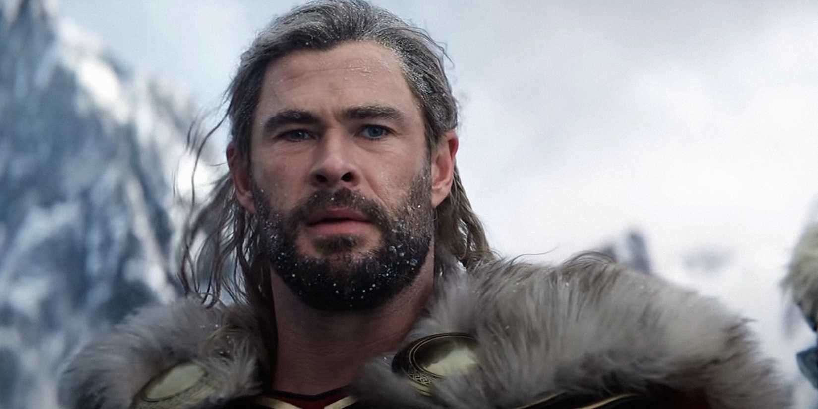 Chris Hemsworth as Thor in front of a mountain in Thor: Love and Thunder.