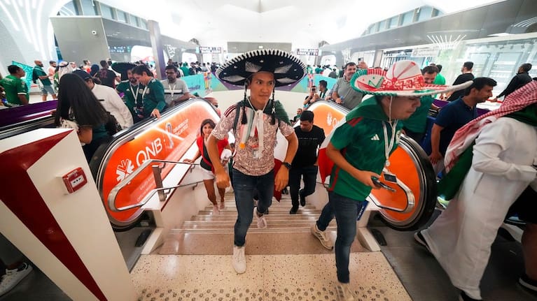 Mexico soccer fans exit the metro station on their way to a World Cup group C soccer match between Saudi Arabia and Mexico, at the Lusail Stadium in Lusail, Qatar, Wednesday, Nov. 30, 2022.