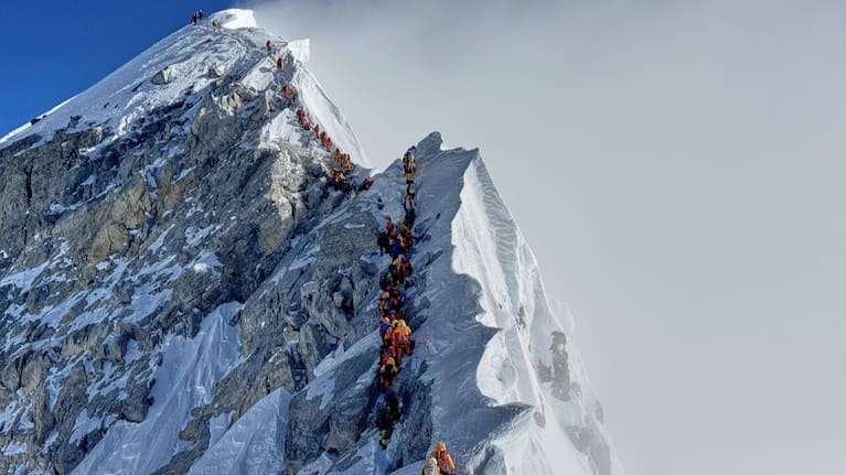 Mountaineers form a queue as they approach the summit of Mount Everest in Nepal, May 18, 2025.