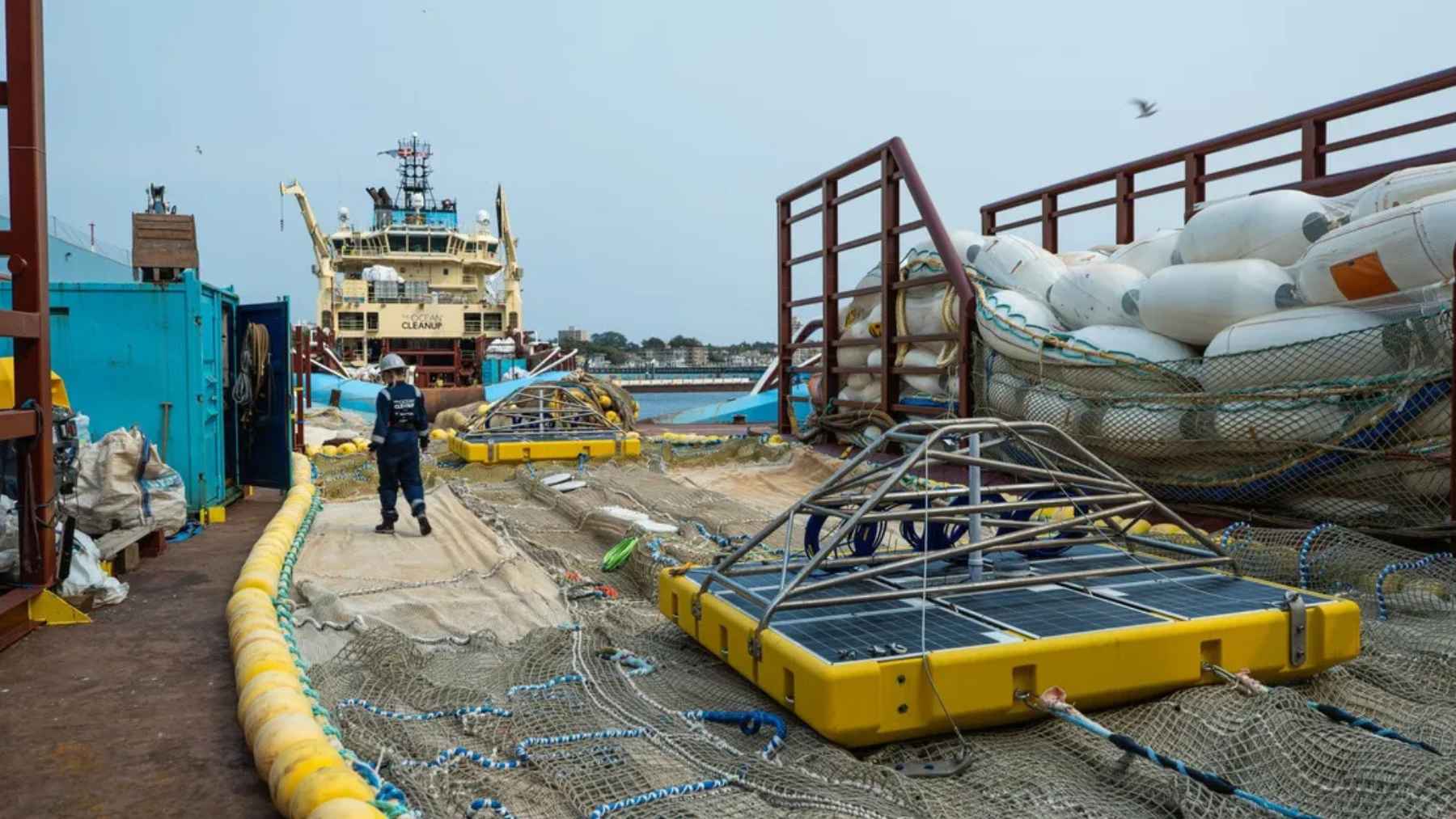Ocean cleanup system collecting floating plastic waste from the sea surface