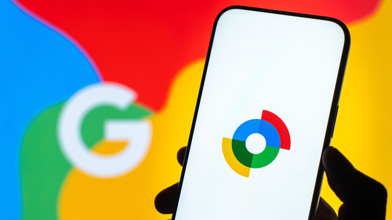 A smartphone displaying the Google Find Hub logo