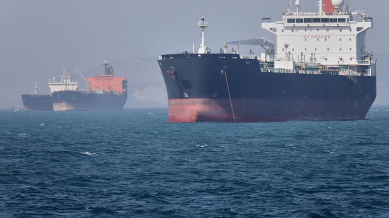 Oil tankers sit at anchor offshore in the Strait of Hormuz off Bandar Abbas, Iran, Saturday, May 2, 2026.