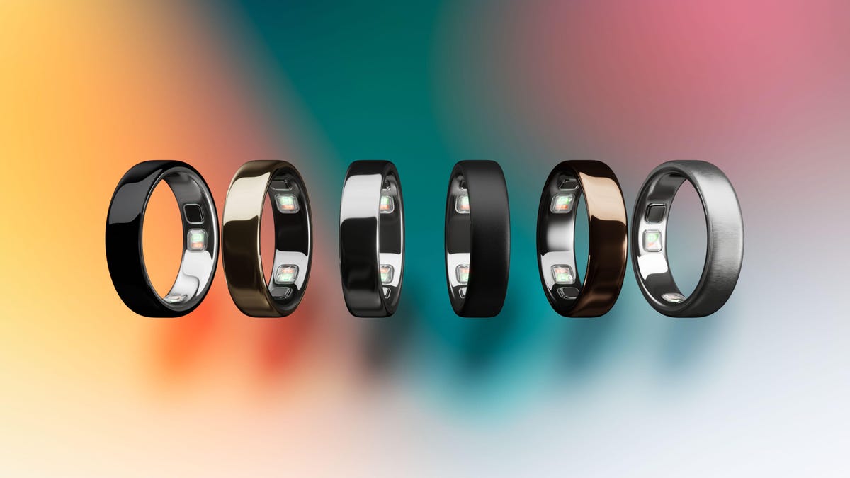 Six rings in a line, all standing on edge in a three-quarters perspective