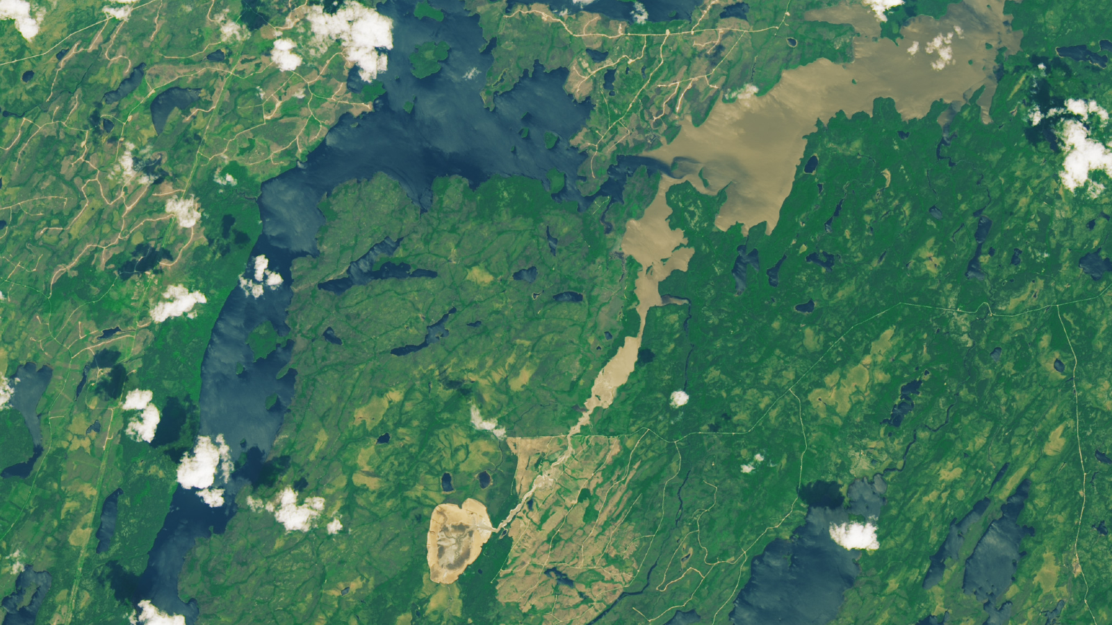 A zoomed out satellite photo showing the extend of the muddy trail created by the outburst flood