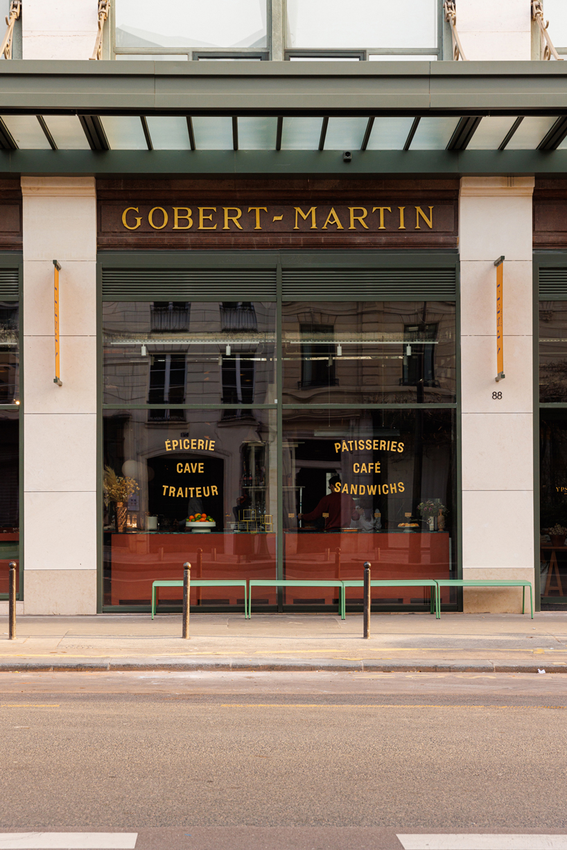 red floor anchors parisian restaurant ypseli with steel and marble textures - 1