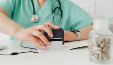 pharmacist marking a prescription
