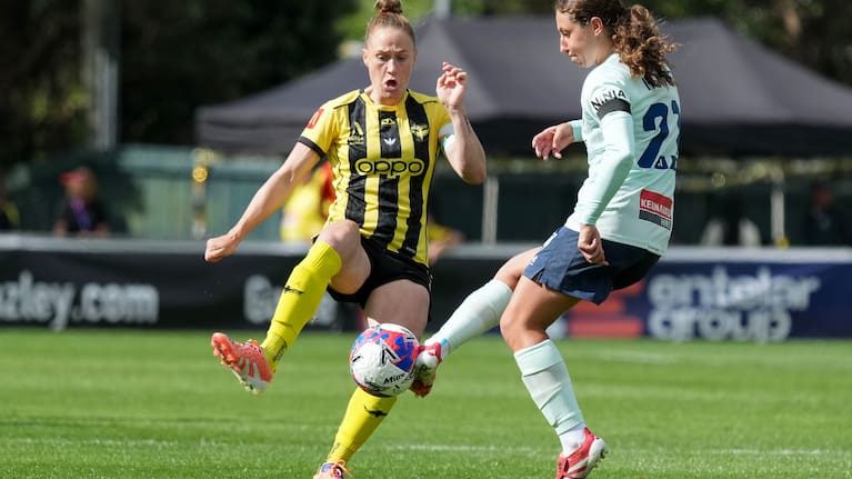 Phoenix CJ Bott (L) with Sydney captain Sarah Hunter during the A-League Women - Wellington Phoenix FC v Sydney FC at Porirua Park, Wellington on the 20 December 2025.