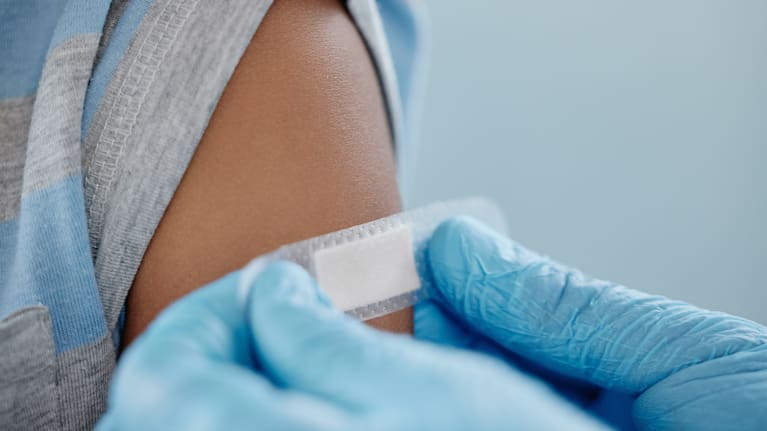 Plaster applied to arm after vaccination (file image).