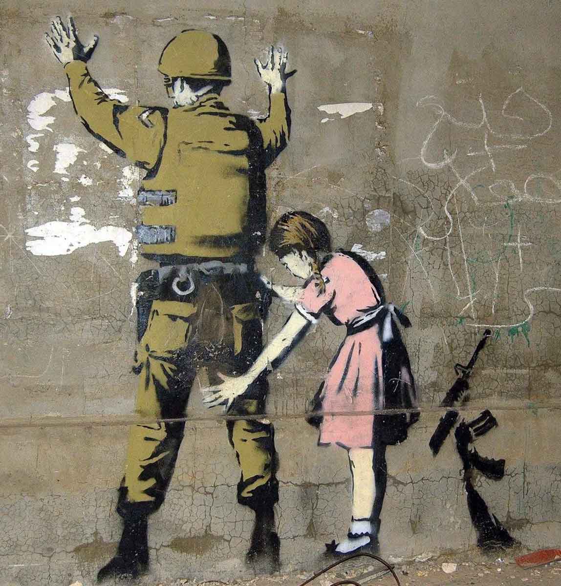 political artworks banksy girl frisking soldier
