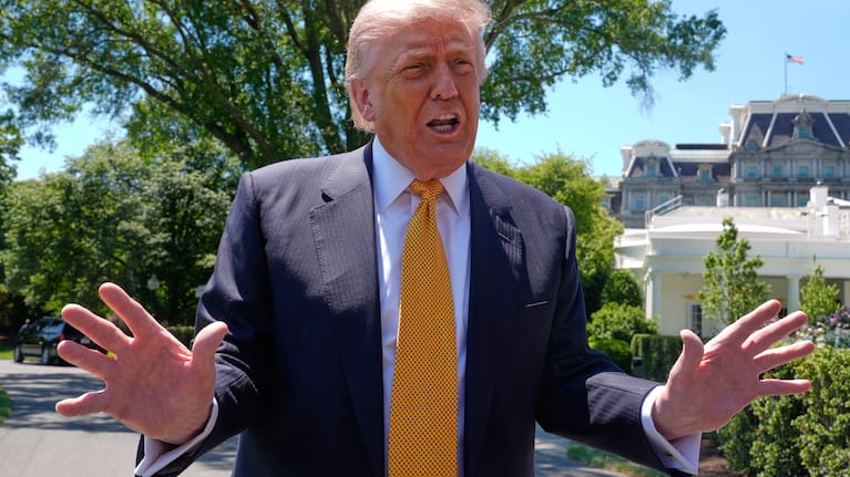 President Donald Trump speaks to reporters as he leaves the White House for travel to Beijing, Wednesday, May 13, 2026, in Washington, to meet with China's President Xi Jinping. 