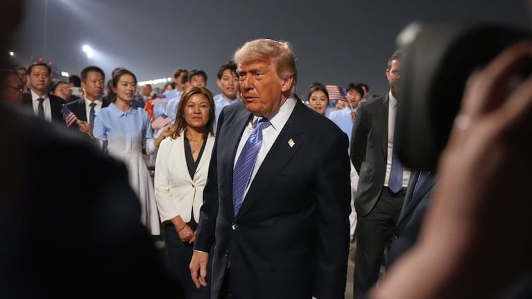 President Donald Trump walks during a welcome ceremony as he arrives on Air Force One, Wednesday, May 13 (local time), 2026, at Beijing Capital International Airport in Beijing.