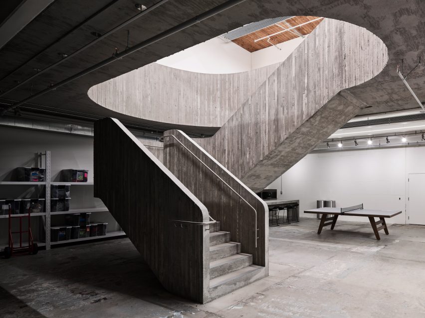 A concrete staircase marked with the wooden formwork used to cast the structure in situ