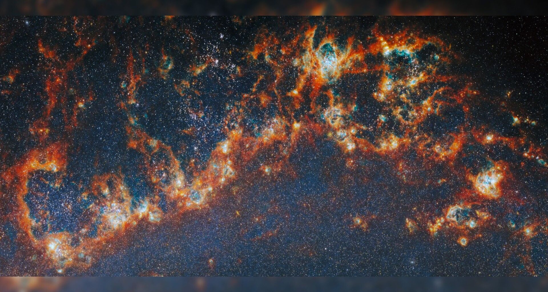 a curl of red-and-white gas on a black starry background