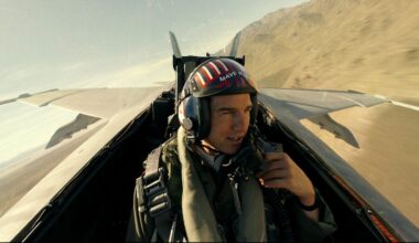 Tom Cruise talking into the radio in an airplane during Top Gun: Maverick.