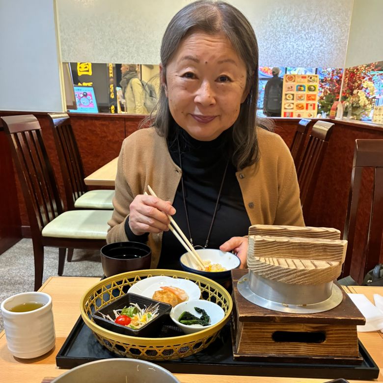 Jane Nagai enjoys a meal in the Shinjuku area of Tokyo during a trip in February.