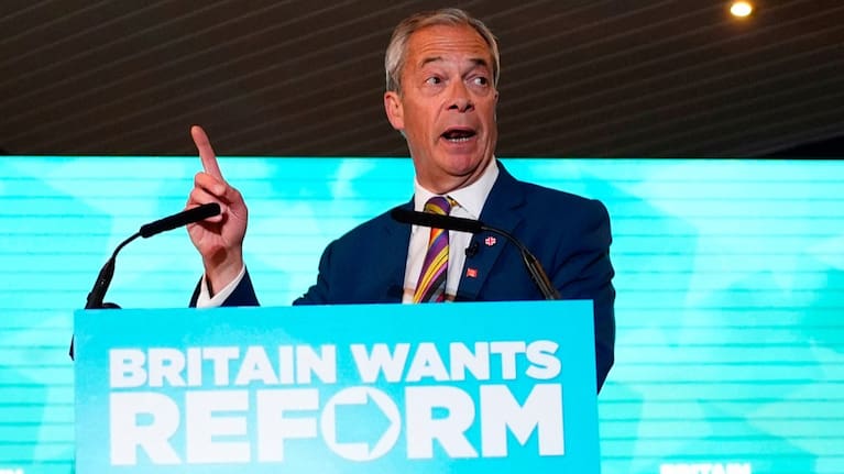 Reform UK leader Nigel Farage speaks to supporters at Chelmsford City Racecourse, Friday May 8, 2026, in Essex, England, following the 2026 local election results.