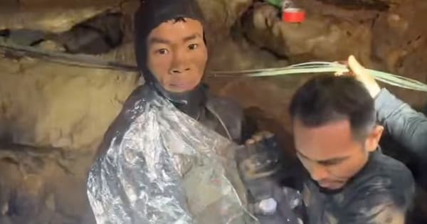 Rescuers save first of five villagers trapped in a cave in Laos