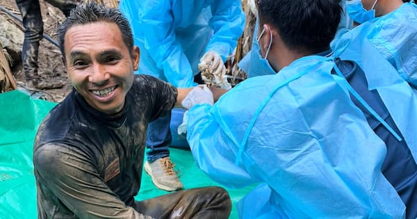 Divers find five alive in flooded Laos cave after more than a week