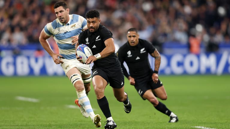 Richie Mo'unga makes a break for the All Blacks during his team's World Cup semifinal win over Argentina in 2023.