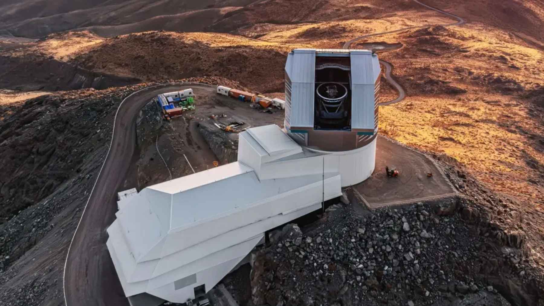 Vera C. Rubin Observatory telescope on a mountain in Chile at sunset, where new sky survey alerts are generated