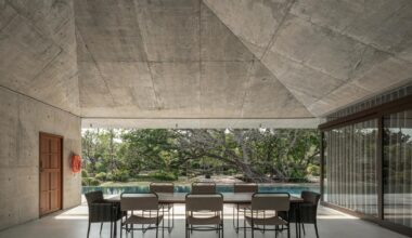 anonym studio shapes saikhoo house around banyan trees in thailand