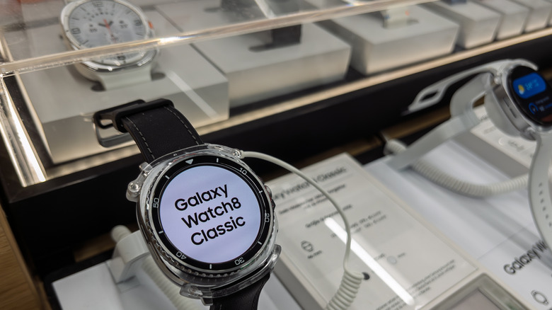 A Samsung Galaxy Watch8 Classic on display at a storefront.