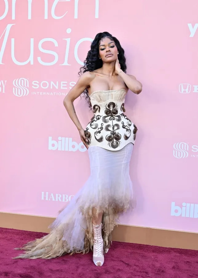 Teyana Taylor made a statement in a sculpted couture look with dramatic details.