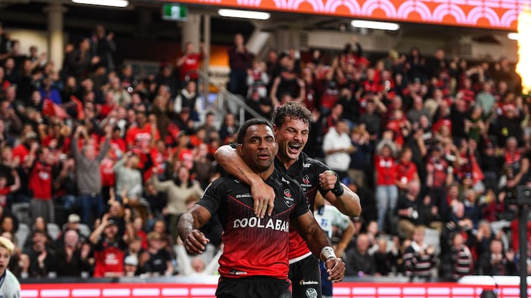 Sevu Reece celebrates his try against the Blues at a full Te Kaha Stadium with teammate Macca Springer.