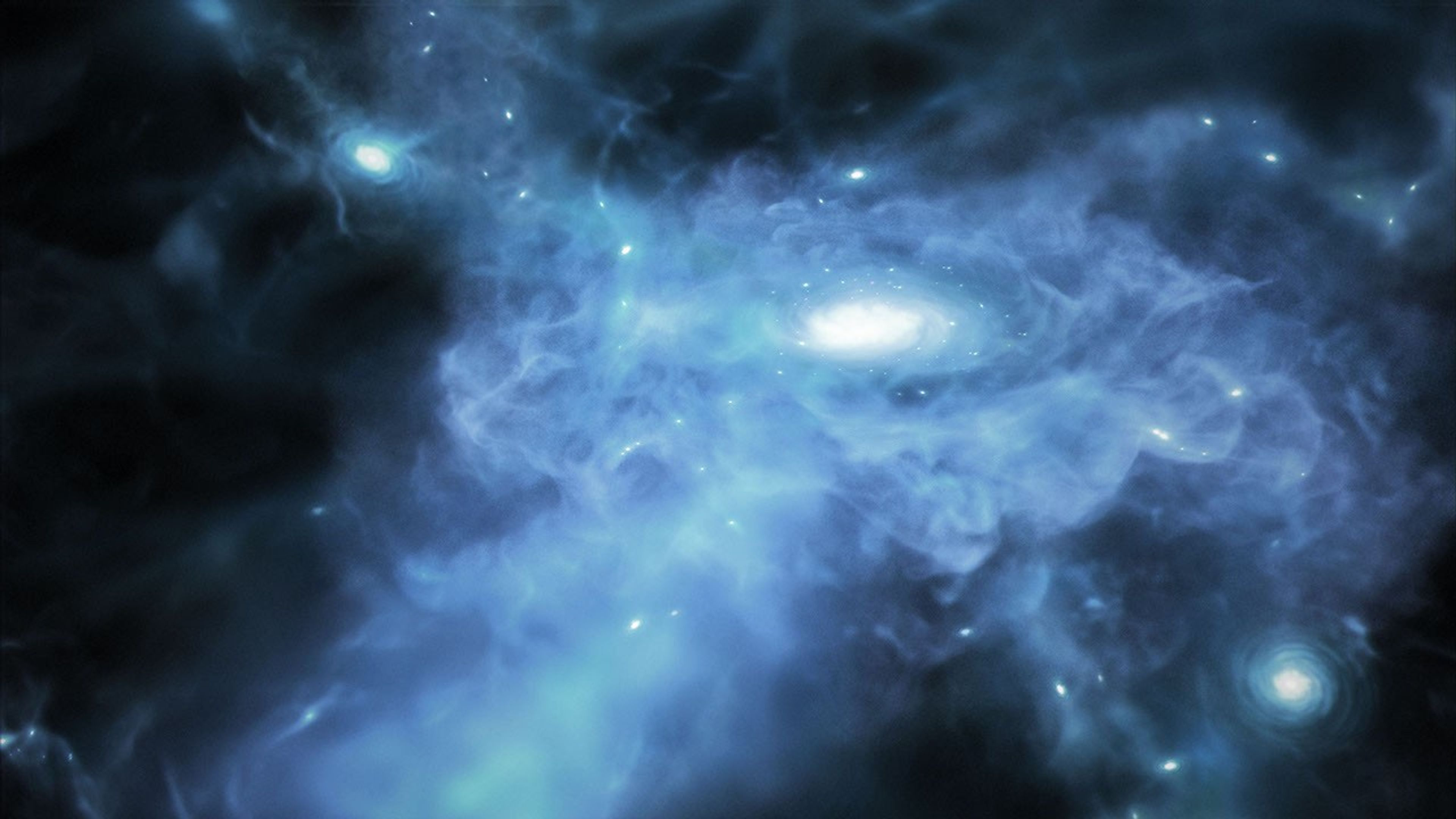Artist's concept showing a galaxy forming only a few hundred million years after the Big Bang, when gas was a mix of transparent and opaque during the Era of Reionization.