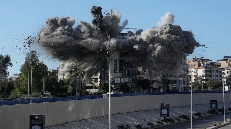 Smoke rises after an Israeli airstrike hits a building near the airport road in Beirut, March 31, 2026.