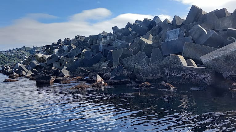 The southern seawall at Wellington Airport has been added to since it was first built in 1954..