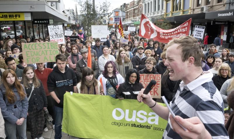 Students march to Octagon in protest of scrapping fees free