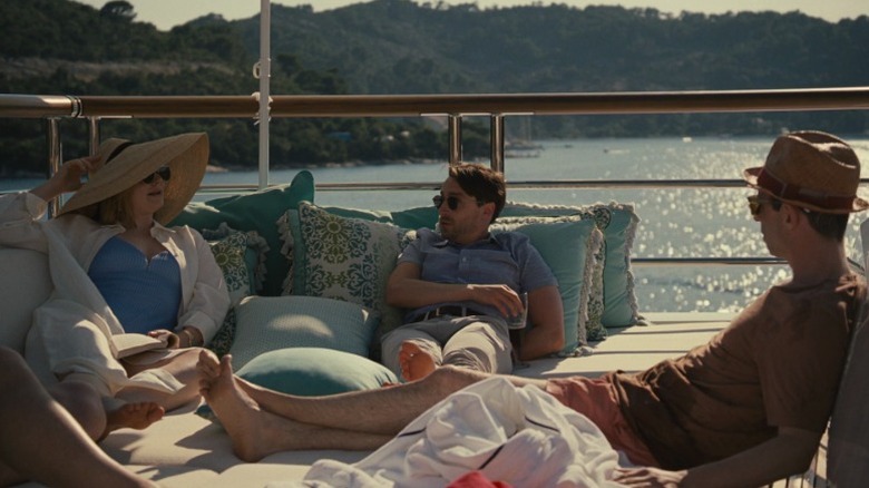 Shiv (Sarah Snook), Roman (Kieran Culkin), and Kendall (Jeremy Strong) relaxing on the yacht on Succession S2E10