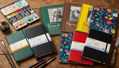 Notebooks and artist sketchbooks on a wooden table