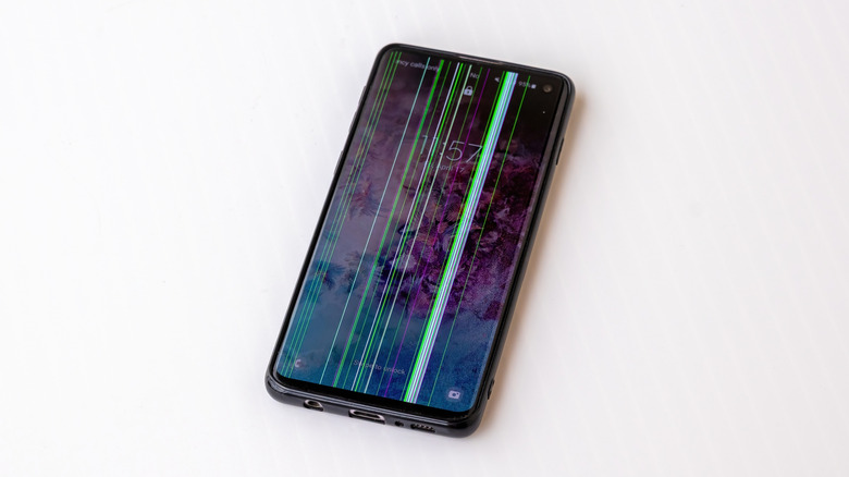 green lines on a Galaxy S10 sitting on a white background