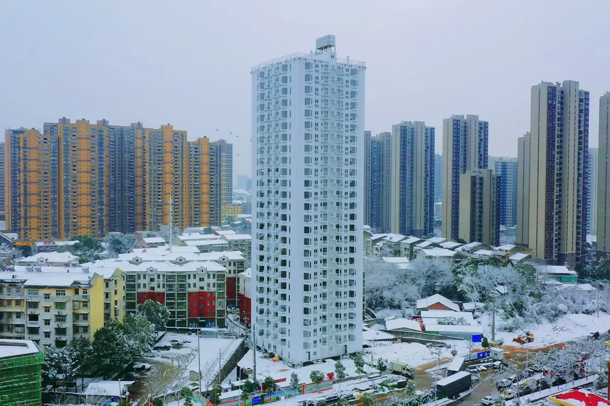 The Entire 26 Story Building Unbolts, Loads Onto Trucks, And Reassembles Elsewhere
