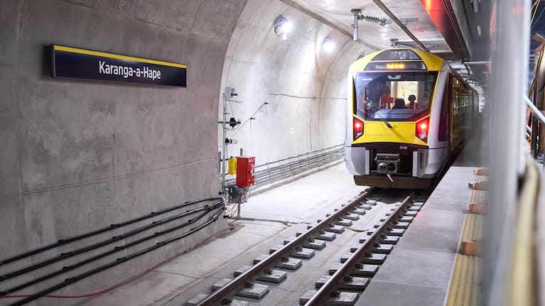 The first test train travels through Auckland's City Rail Link at Karanga-a-Hape station.