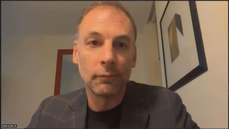 The mayor attended a Wednesday meeting of the council over video call from New York. (Source: Screenshot)